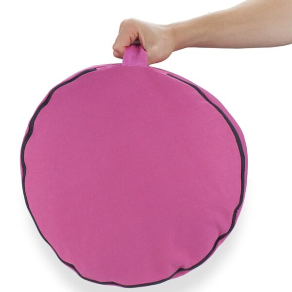 pink zafu meditation cushion 15 inch held