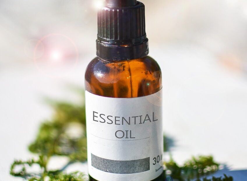 a bottle of essential oils for cleaning