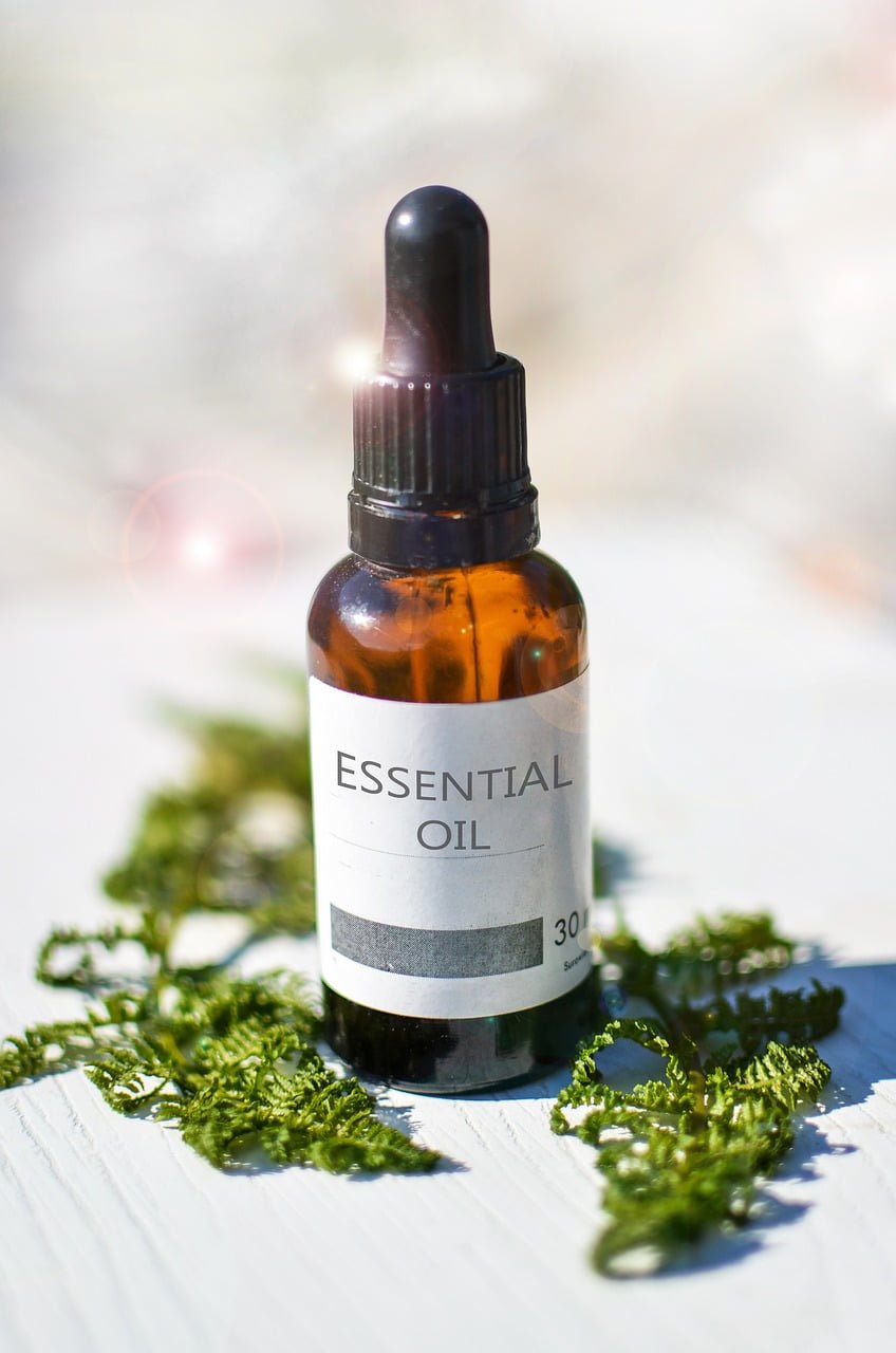 a bottle of essential oils for cleaning
