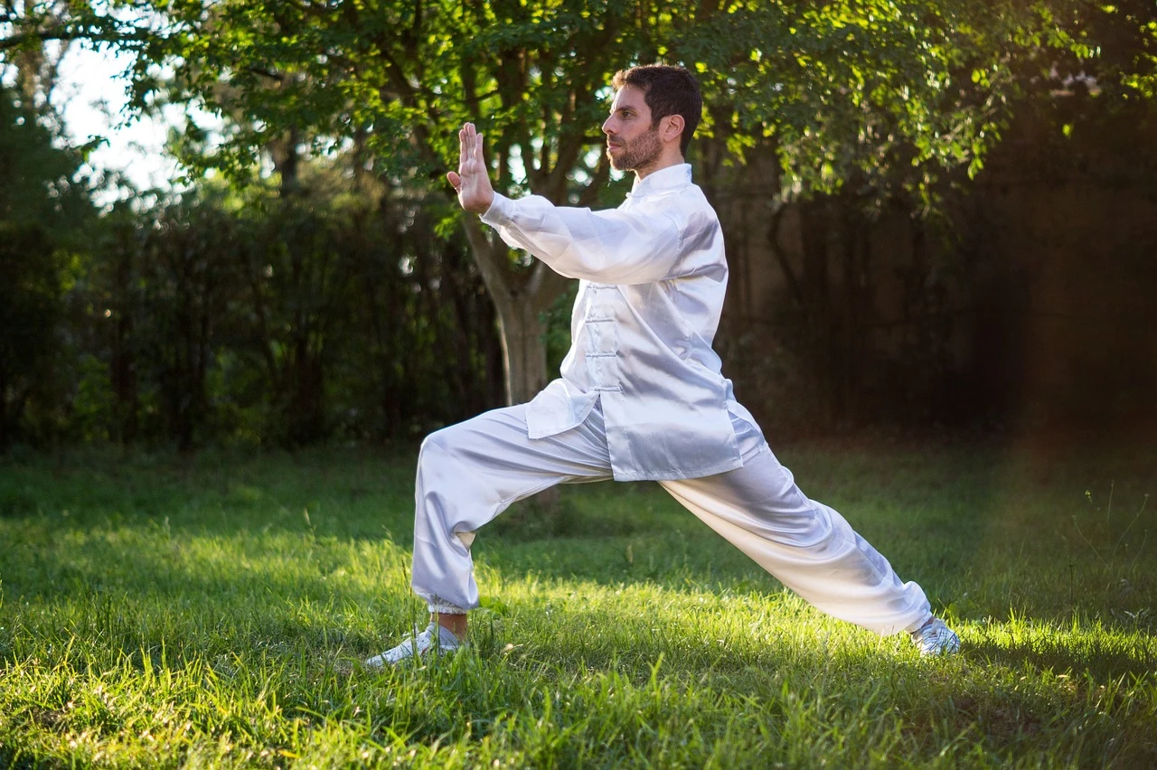 a man showing how can tai chi improve my balance