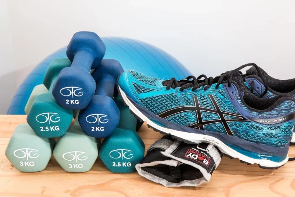 Weights,  a running shoe, and glove for Obesity